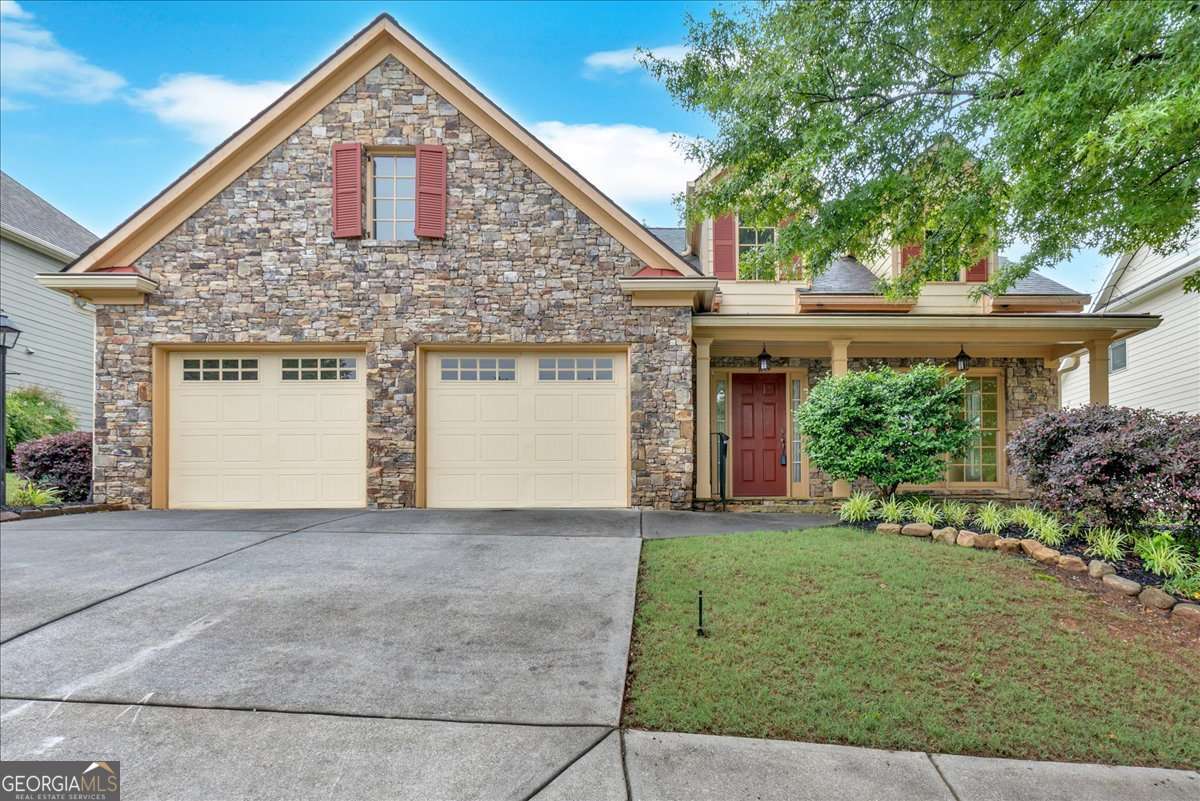 Welcome to 123 Patrick Way, where comfort meets convenience in the heart of Marietta. This beautifully maintained ranch home offers the ease of one-level living in a quiet community just off Whitlock Avenue. With 3 spacious bedrooms, 2.5 bathrooms, and an open, flowing layout, this home is perfect for both everyday living and effortless entertaining. Step inside to discover a light-filled interior featuring high ceilings, elegant architectural details, and generous living spaces. The inviting living room boasts a cozy fireplace and views to the breakfast area and kitchen. The expansive kitchen is a dream for any home chef, complete with granite counters, ample cabinetry, a breakfast bar, and a sunny eat-in area. Tucked away for privacy, the oversized owner's suite offers a serene retreat with a spa-like bath featuring dual vanities, a separate soaking tub, walk-in shower, and a large walk-in closet. Two additional bedrooms and a full bath provide comfort and flexibility for guests, family, or a home office. A dedicated laundry room with lots of storage and half bath add thoughtful convenience. Outside, enjoy a low-maintenance backyard with a patio space perfect for relaxing. With top-rated schools near by, walkway to Laurel Park, Marietta Square just minutes away, and easy access to shopping, dining, and major highways, this home delivers the lifestyle you've been searching for. Don't miss this rare opportunity to own a spacious ranch in an unbeatable location-schedule your showing today!