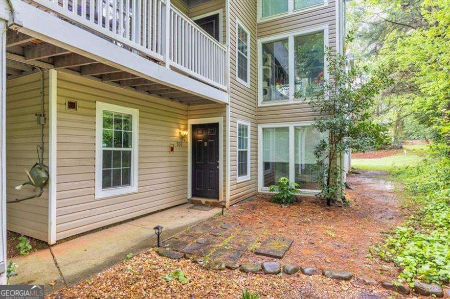This 2/2 Condo offers an Ideal Roommate Floorplan or Flex Living for Individuals. Rent includes Water, Sewer, & Trash Collection! A Stepless Entry Foyer opens to a Large Living Room with a Fireplace. Separate Dining Room & Kitchen w/ stainless steel Appliances, Two Spacious Bedrooms offer Walk-In Closets & Private Bathrooms. Includes washer and dryer. Unwind in the Sun Room w/ Step-Out Patio or at the Community Pool! Easy Access to Nearby KSU & Dozens of Shops & Restaurants!
