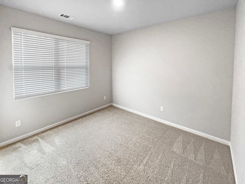 Photo of 8120 Highland Drive SW, Covington, GA 30014 (MLS # 10671244)