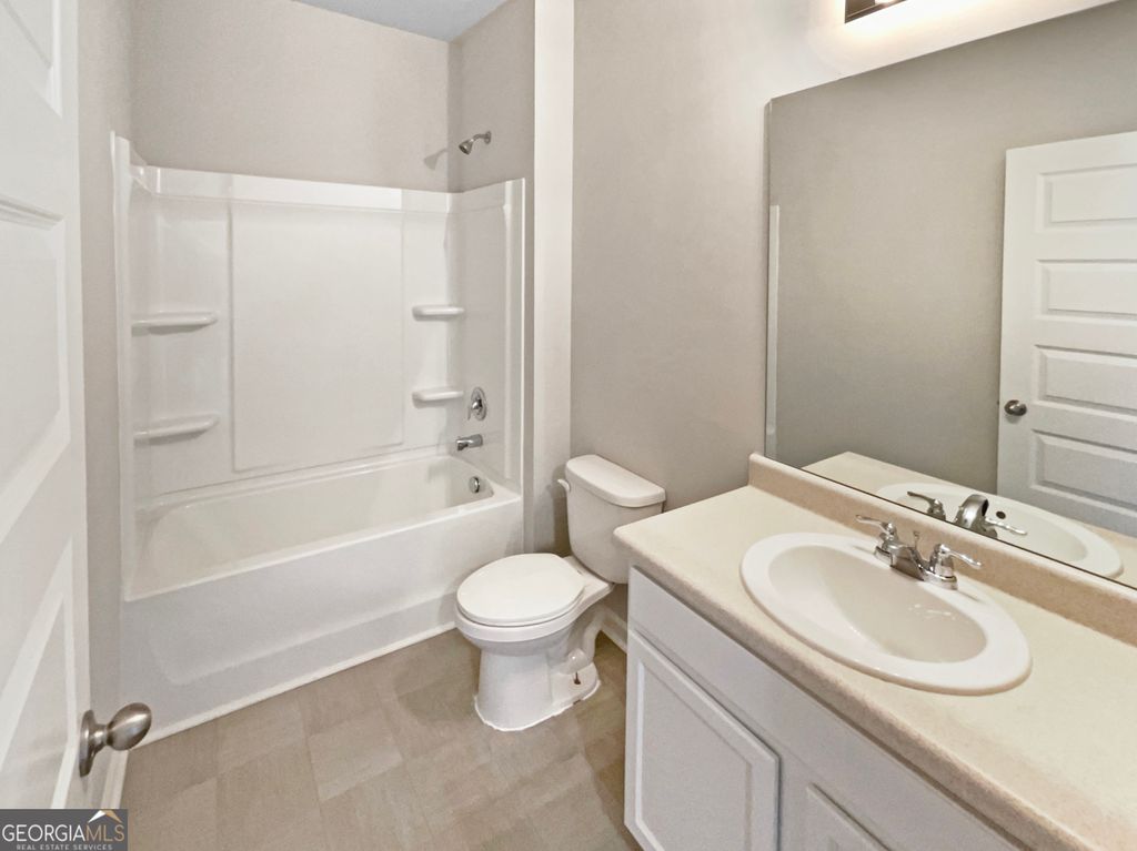 Photo of 8120 Highland Drive SW, Covington, GA 30014 (MLS # 10671244)