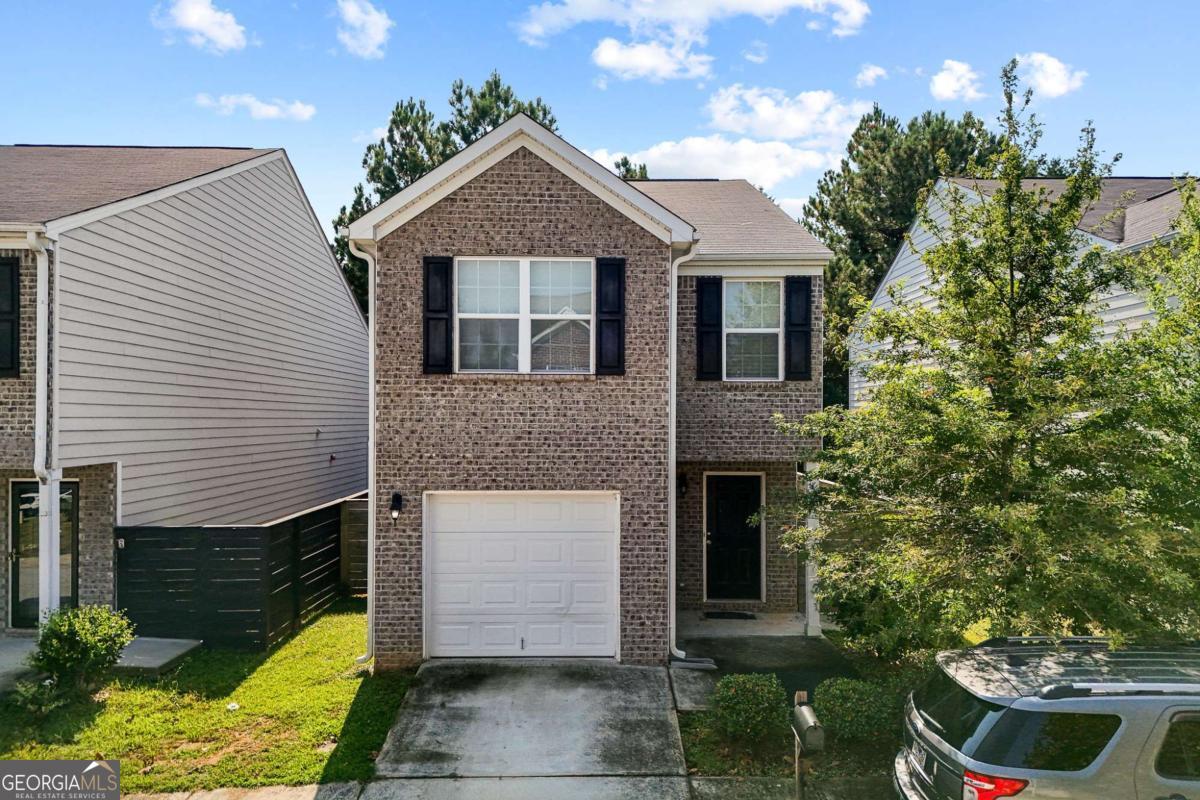 Welcome to this beautiful and well-maintained two-story home, built in 2018, located in the heart of Conyers! This 3-bedroom, 2.5-bath residence offers a perfect blend of comfort, functionality, and modern living. The open-concept main level features a spacious living room, a bright dining area, and a stylish kitchen with an island that doubles as a breakfast bar. Enjoy easy access to the private fenced backyard-ideal for outdoor gatherings and relaxation. Upstairs, the owner's suite boasts a private bath and walk-in closet, complemented by two additional bedrooms, a full bath, and a conveniently located laundry room. This home offers excellent versatility with no rental restrictions-perfect for both homeowners and investors. Situated in a quiet, newer community with low HOA fees, and just minutes from I-20, shopping, dining, and schools, this property truly has it all!