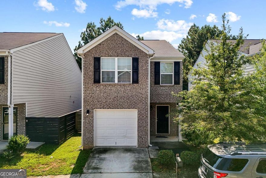 Welcome to this beautiful and well-maintained two-story home, built in 2018, located in the heart of Conyers! This 3-bedroom, 2.5-bath residence offers a perfect blend of comfort, functionality, and modern living. The open-concept main level features a spacious living room, a bright dining area, and a stylish kitchen with an island that doubles as a breakfast bar. Enjoy easy access to the private fenced backyard-ideal for outdoor gatherings and relaxation.    Upstairs, the owner's suite boasts a private bath and walk-in closet, complemented by two additional bedrooms, a full bath, and a conveniently located laundry room. This home offers excellent versatility with no rental restrictions-perfect for both homeowners and investors. Situated in a quiet, newer community with low HOA fees, and just minutes from I-20, shopping, dining, and schools, this property truly has it all!