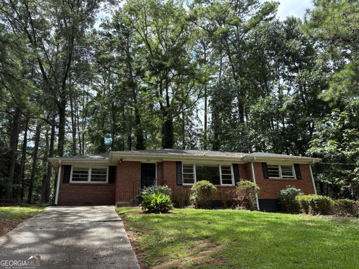 This charming 3-bedroom, 1.5 baths ranch is flooded with natural light and brimming with potential. Original hardwood floors flow throughout, adding timeless character to the home. The cozy layout offers endless possibilities for your personal touch. Situated just minutes from Hartsfield-Jackson Atlanta International Airport and vibrant downtown Atlanta, you'll enjoy easy access to work, dining, shopping, and entertainment. Whether you're a first-time buyer, investor, or looking for a renovation project, this property is a must-see. With its prime location, classic details, and unbeatable price, this East Point gem won't last long. Needs TLC - bring your vision and make it your own!