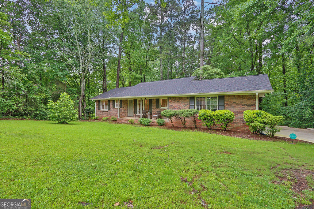 Completely renovated and move-in ready, this stunning home blends timeless design with modern luxury. The heart of the home is a chef-inspired kitchen featuring new custom cabinetry, granite countertops, sleek hardware, and Whirlpool stainless steel appliances-perfect for entertaining and everyday living. Upgrades include a new roof, HVAC, water heater, driveway, interior/exterior paint, recessed lighting, and beautifully refinished hardwoods on the main level. Every detail has been thoughtfully designed for style and function. The lower level offers a private full in-law suite, complete with its own kitchen, living space, bedroom, and full bath-ideal for guests, multigenerational living, or rental potential. Located in the desirable Lake Lucerne Estates, with exclusive lake access, clubhouse amenities, and top-rated Parkview schools. This is more than a home-it's a lifestyle.