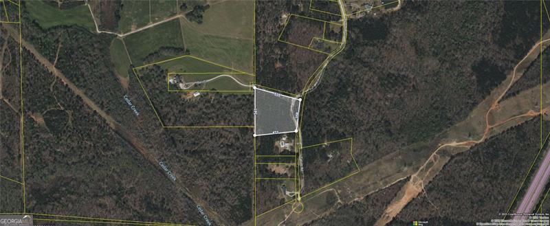 Discover the perfect blend of privacy and convenience with this 4.33-acre fully wooded lot in Palmetto, GA. Zoned for multi-use, this property offers endless potential-whether you're looking to build your dream home or invest in future development. The lot features a beautiful home site surrounded by mature trees, creating a private retreat just under 20 minutes from Hartsfield-Jackson Atlanta International Airport. Conveniently located near shopping, a local hospital, and top-rated schools, this property combines rural charm with city accessibility. Don't miss this wonderful opportunity to create your ideal lifestyle on this private, wooded acreage!