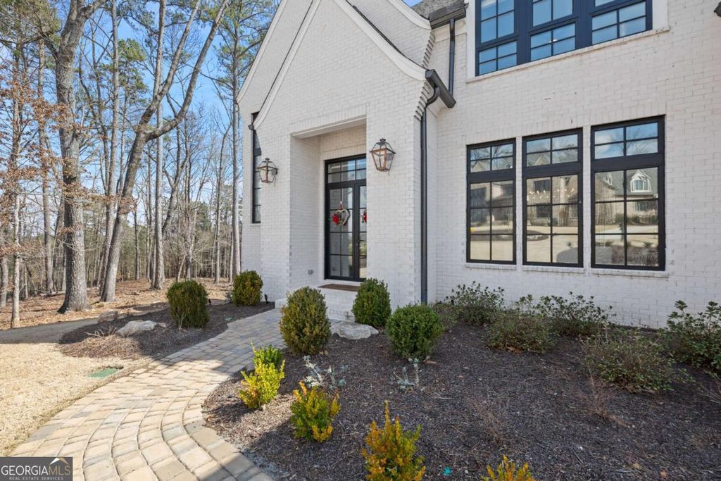 Photo of 761 Woodvale Point, Suwanee, GA 30024 (MLS # 10766163)