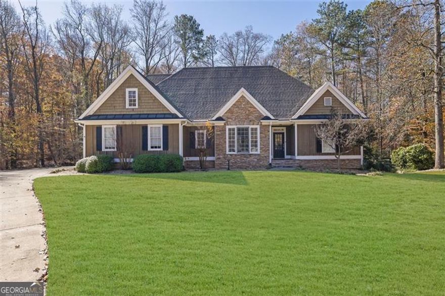 This captivating ranch-style home nestled on over 2 acres in Birmingham Manor on a peaceful and secluded cul-de-sac. The gourmet kitchen boasts ample counter space, stainless steel appliances, and a handy built in desk.  The breakfast nook overlooks the huge fenced backyard and has views of the surrounding wood. A dedicated dining room offers ample space for cherished family dinners and festive holiday celebrations. Elegant touches like wainscoting crown molding, columns, and hardwood floors elevate the ambiance, creating a space both sophisticated and inviting. Gather in the heart of the home, the family room, featuring a majestic marble fireplace with crown molding and cathedral ceilings.  Retreat to the spacious primary suite with tray ceilings. Unwind in the spa-like master bath with tile shower, soaking tub and two separate vanities. Generously-sized secondary bedrooms and bathroom offer comfortable accommodations for family or welcomed guests.  Recent upgrades include an oversized HVAC system and a newer hot water heater. LED lighting throughout enhances energy efficiency. A huge deck overlooks the expansive fenced backyard, bordered by a tranquil creek and a natural setting of woods and offers privacy and serenity.