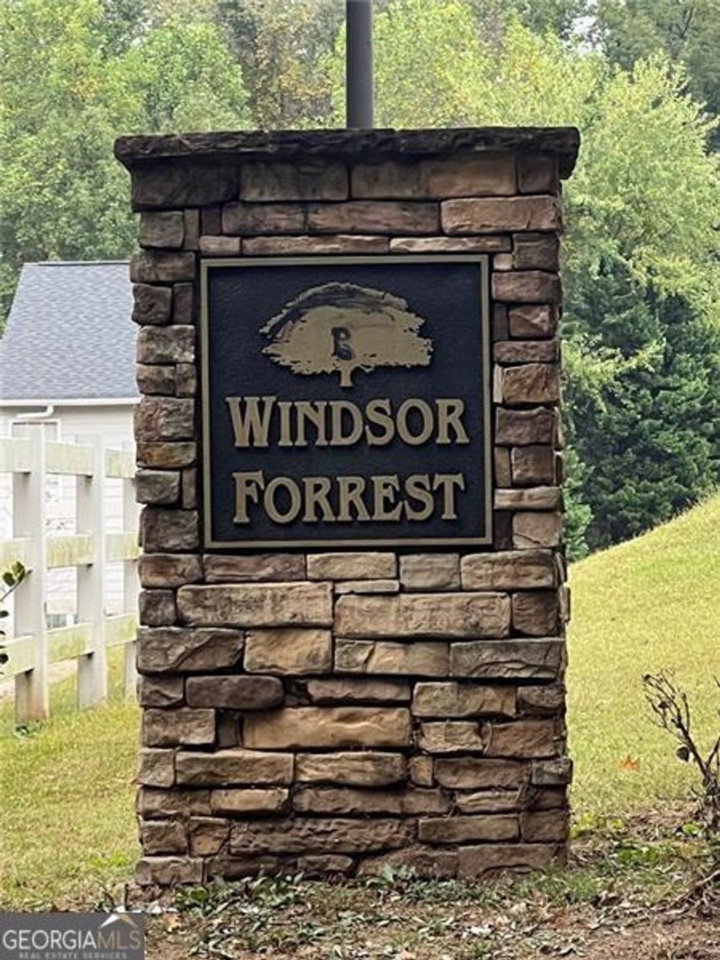 Photo of 2863 WINDSOR FORREST Ct, Atlanta, GA 30349 (MLS # 10629757)