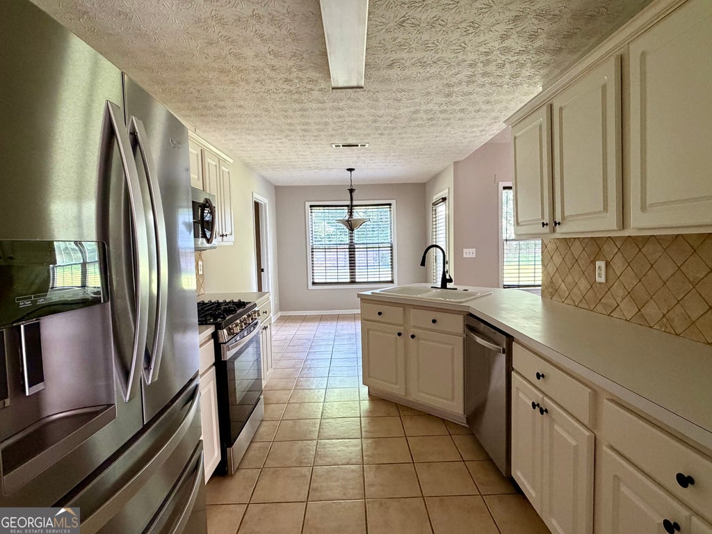 Photo of 6130 Devonshire Drive, Flowery Branch, GA 30542 (MLS # 10800682)