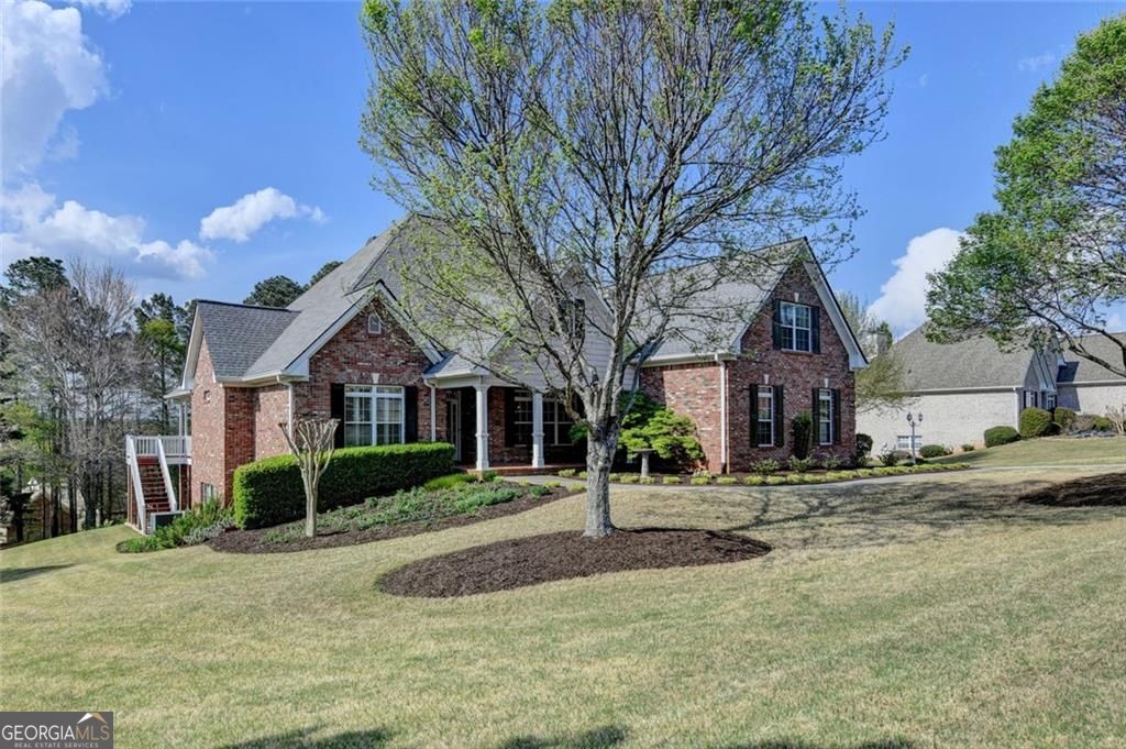 Photo of 517 Sandy Cove Drive, Loganville, GA 30052 (MLS # 10728443)