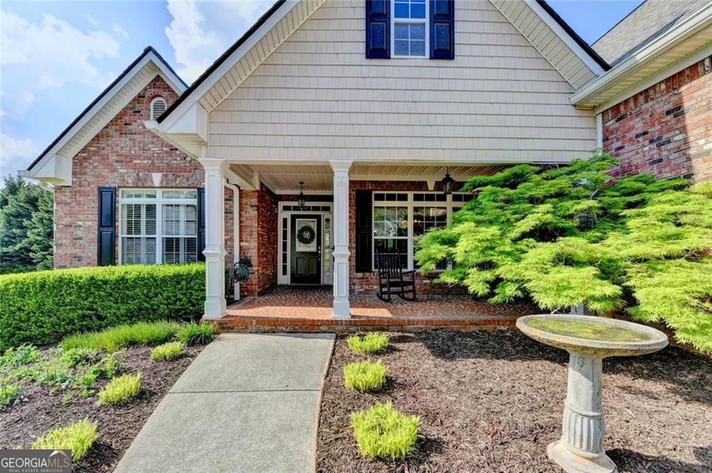 Photo of 517 Sandy Cove Drive, Loganville, GA 30052 (MLS # 10728443)