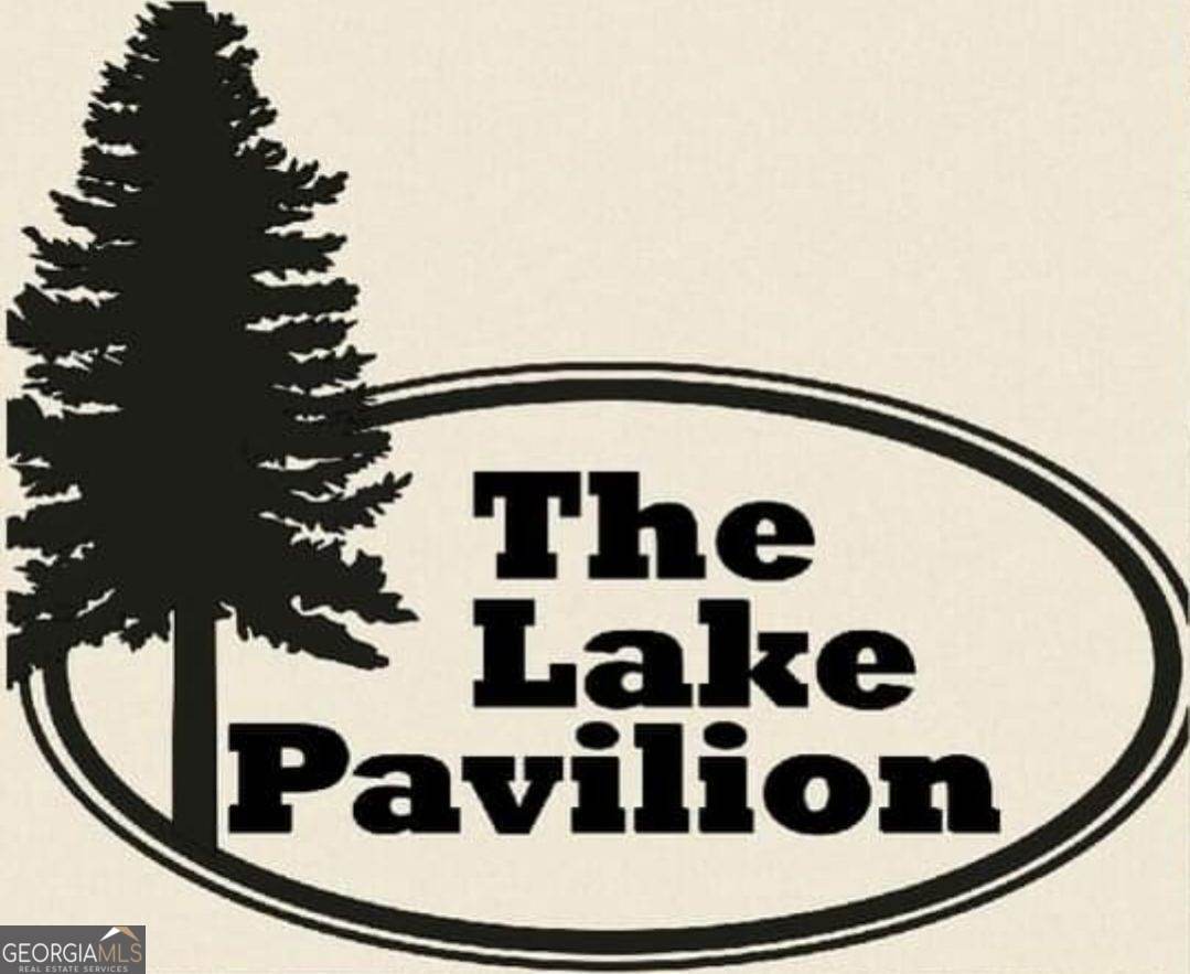 The Lake Pavilion - This 31 acre property has long been utilized for a variety of events such as weddings, chili cookoffs, charity events, family and class reunions, small concerts, church and corporate events, and other large gatherings. The property is an income producing entertainment and recreational outdoor venue. Activities include hiking, camping, fishing, boating, horseshoes and kids playground. Sporting areas include a basketball court and a recreational field for football, baseball, softball, kickball or soccer. The property boasts a 5,000 square foot roofed pavilion with a large stone fireplace with restrooms and event prep kitchenette. The pavilion offers a breath-taking panoramic view of the lake and is ideal for entertaining guests. Two recent additions include the amphitheater stage area and 1 room/1 bath cottage. The parking and recreational field areas could also be repurposed for onsite RV camping or a variety of other uses. The property is only minutes from downtown Griffin, local hotels, and restaurants.