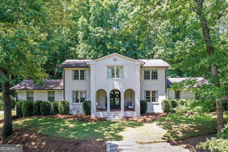 Tucked up and away on one of the most centrally located streets in the heart of Gainesville and within walking distance or a golf cart ride to the downtown Gainesville Square, you will quickly find this finely dressed jewel on the hill has it all- location, condition and price. A true family home, large living spaces and gracious sleeping arrangements welcome family and friends, yet allow empty nesters to maintain a comfortable space on the ground floor. The level backyard entertaining space is ideal for outdoor dining and play, and opens up conversations of a pool should you wish to add one in the future. Meticulously maintained, inspected and serviced by licensed professionals, expect no surprises other than ones to remove any concerns for costly maintenance or upkeep and with a decorator's design, you can truly turn the key and begin making this house your new home!