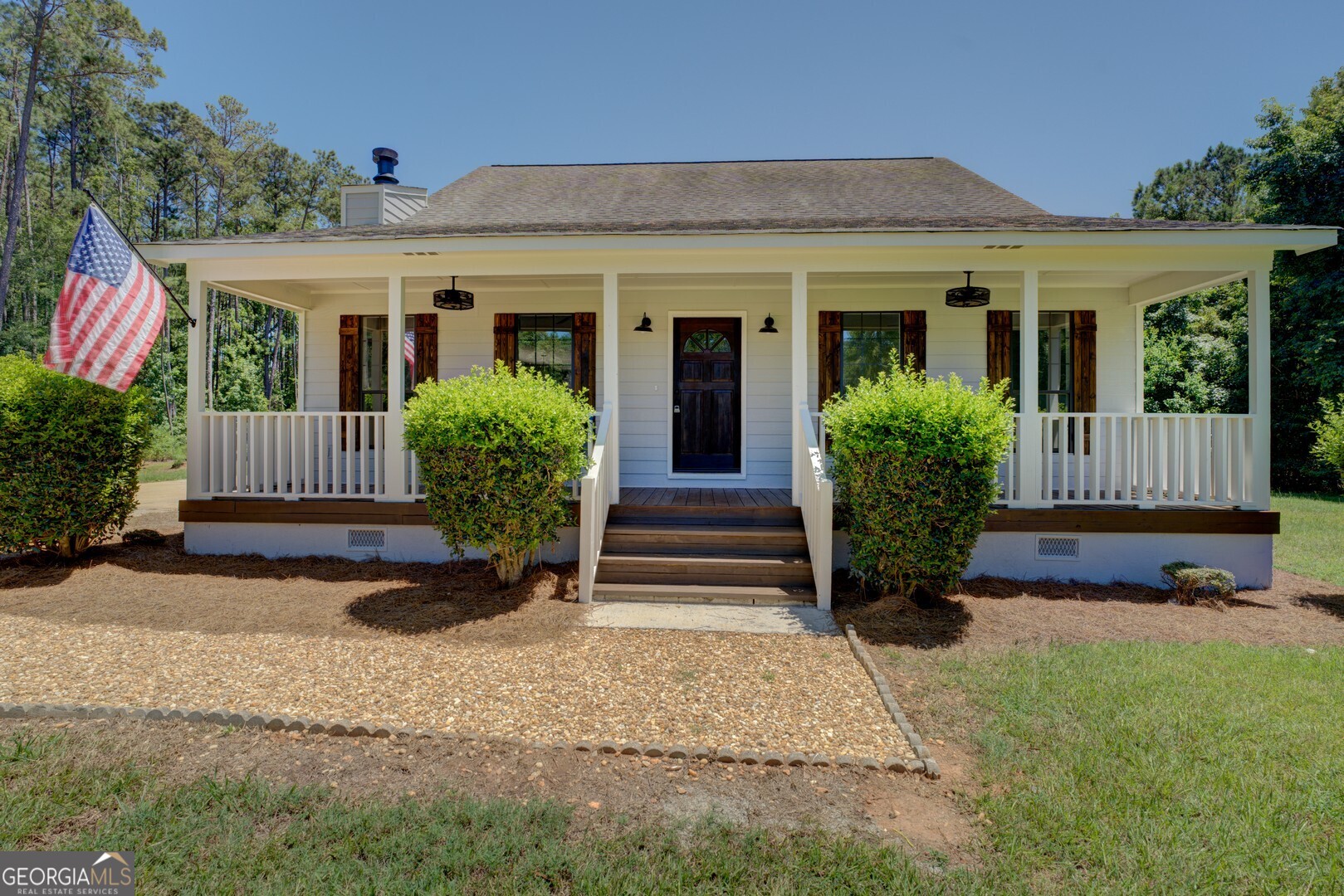 This charming country home has been renovated from top to bottom. The spacious layout features a primary bedroom with deck access, en suite bathroom, and large walk-in closet opposite 2 generous-sized bedrooms that share a large bathroom. Ugrades include all-new paint, new flooring, light fixtures, plumbing fixtures, granite countertops, tile backsplash, and stainless steel appliances. Upstairs there is plenty of room to expand with an additional 720sf ready for your finishing touches! Almost 3 acres surrounds a solitude for outdoor living with a spacious deck for entertaining and a private, level yard. Located in a charming neighborhood just off of Hwy 441.