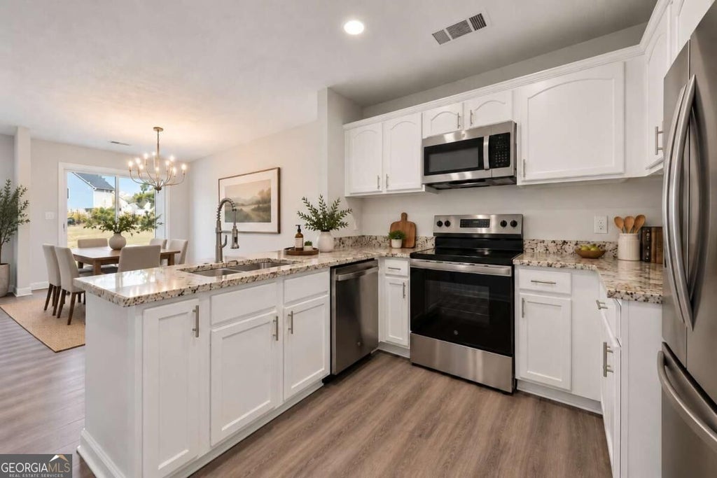Photo of 530 Parkway Road, Fairburn, GA 30291 (MLS # 10880281)
