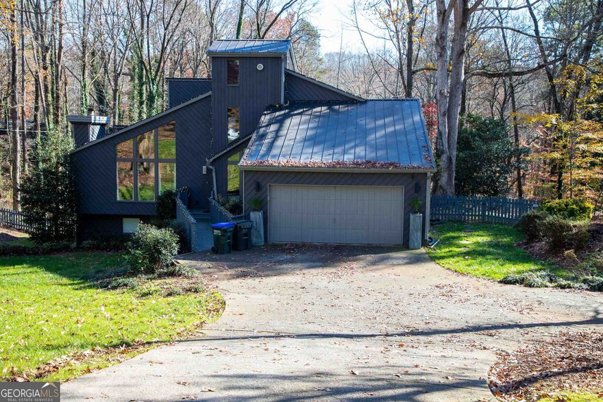 Welcome to your exquisitely renovated dream home, where luxury meets comfort in a seamless blend of design and functionality. This property welcomes you with a stepless entrance into the main level, featuring real hardwood floors throughout, a spacious owner's suite, and a large chef's kitchen equipped with stainless steel appliances, quartz countertops, and a double oven, all designed to cater to your culinary adventures. The kitchen opens up to a two-story family room, flooded with natural light, creating a warm, inviting space. The upper level boasts three large bedrooms and a full bathroom, each space crafted for comfort and serenity. Descend to the fully finished terrace level, which houses a bedroom, two expansive recreational spaces ideal for an office or hobbies, and a full bath, all atop durable luxury vinyl flooring. The newer HVAC systems, hot water heater, and roof ensure peace of mind. Outside, the private, fenced backyard with an in-ground swimming pool, screened porch, and deck overlooks the lush, wooded lot, offering a tranquil retreat. This property, with its thoughtful renovations and luxurious finishes, is a testament to sophisticated living.  Owner/Agent.