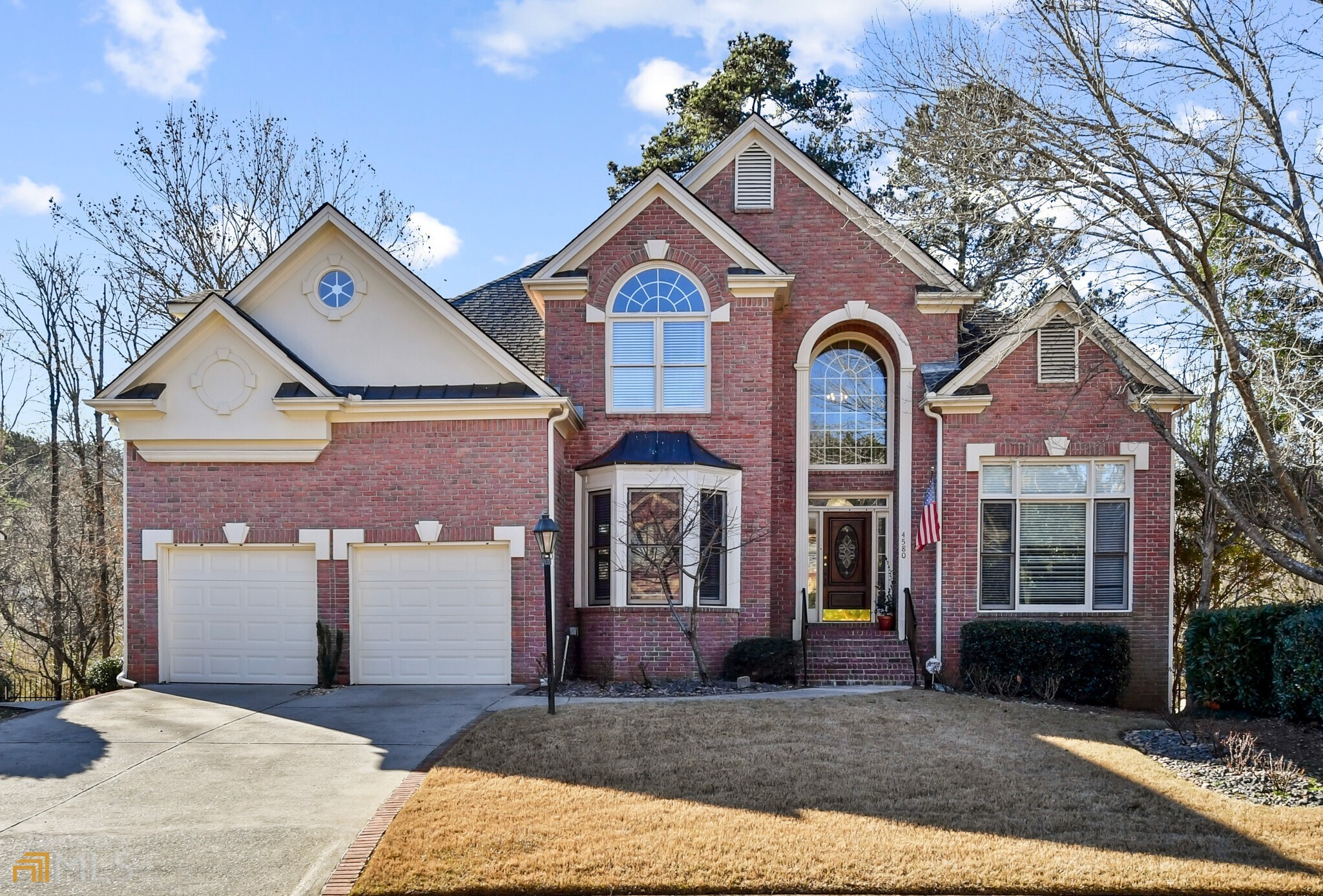 Bright, all-brick home in a quiet neighborhood just outside Atlanta in Sandy Springs off Windsor Parkway, has 5 bedrooms and 3 1/2 baths, full unfinished basement, a 2-car garage and a large private back yard. There are 10-foot ceilings on the main and 9-foot ceilings upstairs, some new hardwood floors, all new carpet and numerous other kitchen and bath upgrades. Excellent schools are High Point Elementary, Ridgeview Middle and Riverwood International Charter School.