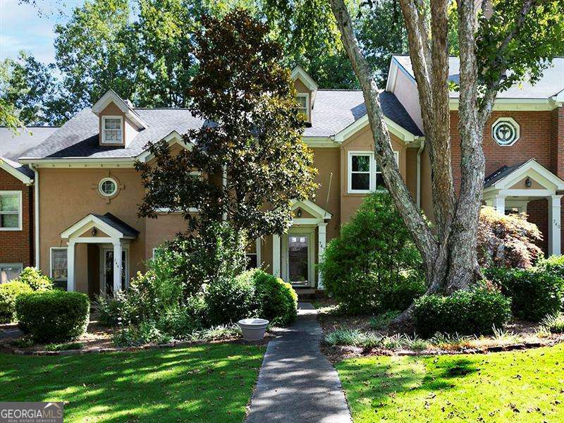 Welcome to your new home in one of Cobb CountyCOs most desirable neighborhoods, prized for its top-rated Walton High School. This beautifully updated townhome combines modern comfort with unbeatable convenience, nestled in a vibrant community with easy access to shopping, dining, and transportation. Step into this move-in-ready gem and enjoy recent updates, including fresh paint, updated kitchen with quartz countertops, sleek stainless steel appliances, and stylish modern fixtures. The homeCOs charm is further enhanced by a private deck, perfect for relaxing or entertaining. Inside, youCOll find a spacious layout with a two-car garage and a finished terrace-level bonus room complete with a full bathroomCoideal for hosting guests, creating a home office, or setting up a recreational space. This well-maintained home offers low HOA dues, which include several utility services, delivering exceptional value. Additionally, residents can take advantage of affordable membership at The Olde Towne Athletic Club, featuring premium amenities like indoor and outdoor tennis courts, a sparkling swimming pool, a state-of-the-art fitness center, and indoor and outdoor bars. The on-site restaurant with a rotating seasonal menu ensures thereCOs always something delicious to enjoy. DonCOt miss this incredible opportunity to own a townhome in a prime location with access to fantastic amenities and one of the best school districts in the area