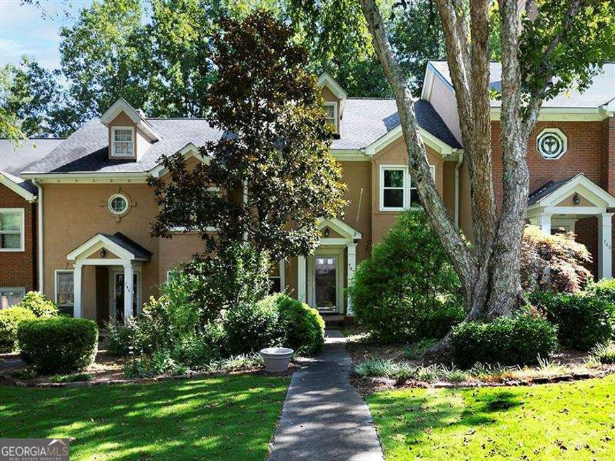Welcome to your new home in one of Cobb CountyCOs most desirable neighborhoods, prized for its top-rated Walton High School. This beautifully updated townhome combines modern comfort with unbeatable convenience, nestled in a vibrant community with easy access to shopping, dining, and transportation.    Step into this move-in-ready gem and enjoy recent updates, including fresh paint, updated kitchen with quartz countertops, sleek stainless steel appliances, and stylish modern fixtures. The homeCOs charm is further enhanced by a private deck, perfect for relaxing or entertaining. Inside, youCOll find a spacious layout with a two-car garage and a finished terrace-level bonus room complete with a full bathroomCoideal for hosting guests, creating a home office, or setting up a recreational space. This well-maintained home offers low HOA dues, which include several utility services, delivering exceptional value. Additionally, residents can take advantage of affordable membership at The Olde Towne Athletic Club, featuring premium amenities like indoor and outdoor tennis courts, a sparkling swimming pool, a state-of-the-art fitness center, and indoor and outdoor bars. The on-site restaurant with a rotating seasonal menu ensures thereCOs always something delicious to enjoy.    DonCOt miss this incredible opportunity to own a townhome in a prime location with access to fantastic amenities and one of the best school districts in the area