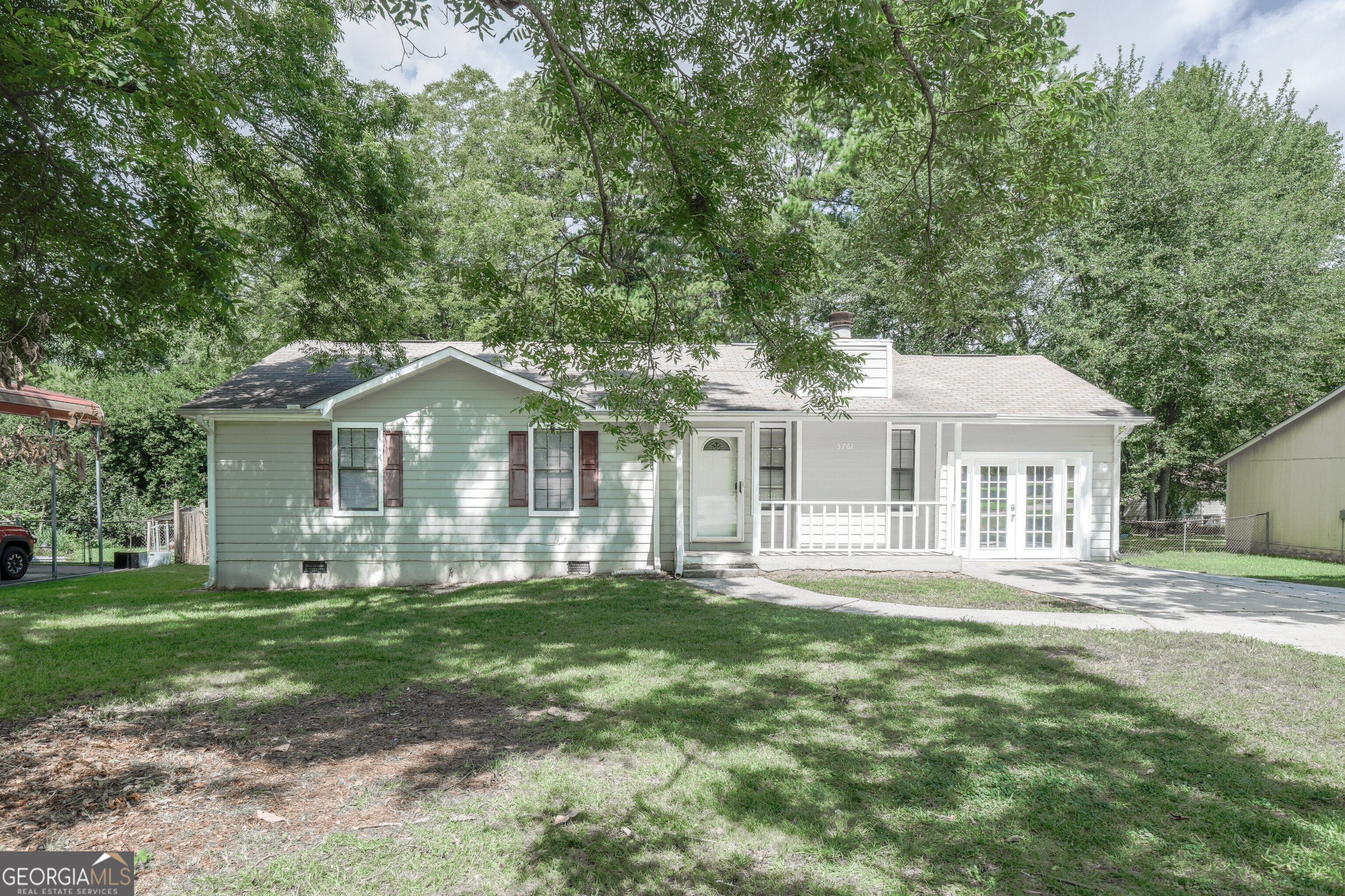 Welcome to this charming 3-bedroom, 2-bathroom home, offering over 1,400 square feet of well-designed living space with stylish updates throughout. Step into a spacious living room featuring high ceilings and abundant light throughout. This home has a great functional layout for beds and baths for a family or as a rental. Out back, you'll find a generous deck overlooking a large, fenced-in backyard ideal for hosting gatherings, gardening, or letting pets and kids play safely. Conveniently located just 12 miles from Hartsfield-Jackson International Airport and 16 miles from downtown Atlanta, this home combines comfort, convenience, and a great location. Don't miss this opportunity to own a beautifully maintained home that offers both space and accessibility!