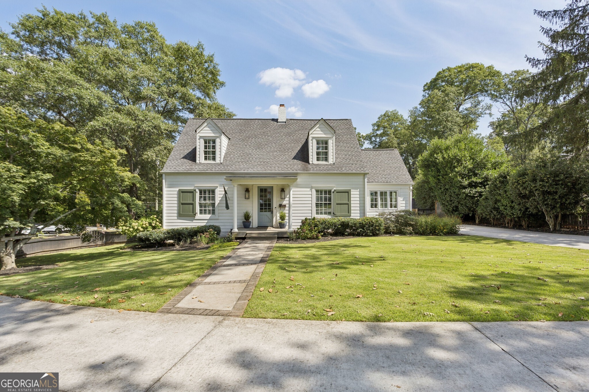 The Atherton House | Classic Charm Meets Modern Luxury in Historic Marietta! Just steps from Marietta Square, this Fully Renovated residence blends timeless Character with high-end finishes for today's lifestyle. Inside, walls of Natural Light highlight the Spacious Family Room anchored by a cozy Fireplace. The Chef's Kitchen will impress with a Custom Marble Backsplash, Top-of-the-Line Stainless Steel Appliances including a 36" Gas Range, and a Large Island Breakfast Bar perfect for gathering. Flow seamlessly into the Dining Room, ideal for both casual meals and elegant entertaining. The Main Level Owner's Suite is a retreat of its own complete with a Private Porch overlooking the Backyard, a second Fireplace, and a Spa-Like Ensuite featuring Dual Vanities and an Oversized Tiled Shower with Dual Shower Heads. A second Full Bathroom and one of two Laundry Rooms with ample Storage round out the main floor. Upstairs, find Three Spacious Bedrooms and a beautifully designed Hall Bathroom. The Expansive Unfinished Basement offers over 1,000 square feet of possibilities recently updated with painted brick walls and insulation, ready to be customized into your dream space. Step outside into your own Backyard Paradise! Enjoy evenings by the Firepit, Grassy Yard, a convenient Outdoor Shower, and plenty of storage with a dedicated Shed. All this just moments from Marietta Square's Restaurants, Shops, and Community Events, with easy access to Wellstar Hospital, Parks, and Highways. This is more than a home it's a lifestyle in the heart of Historic Marietta!
