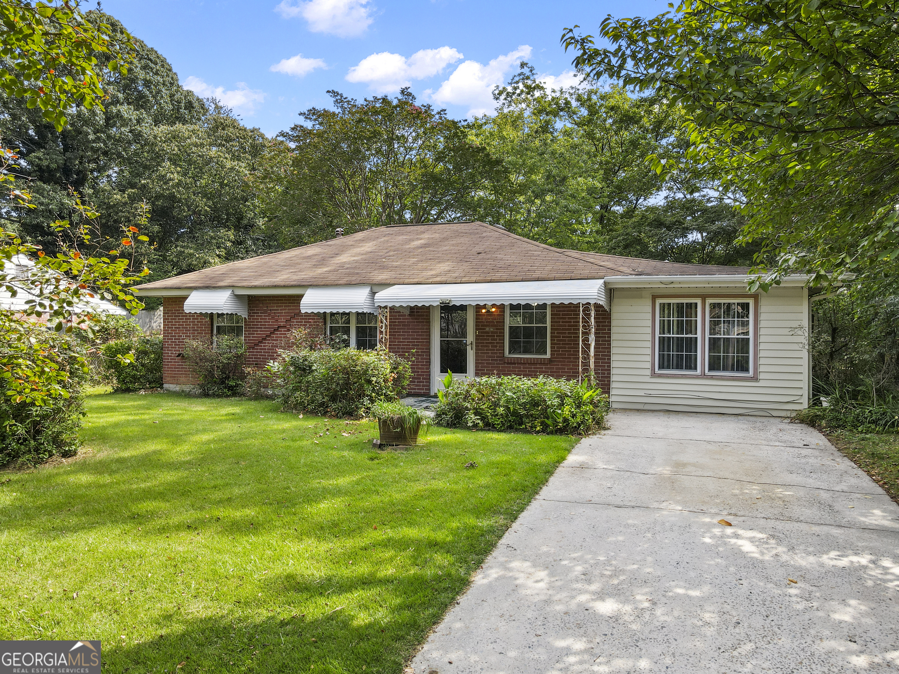 Welcome to this classic 3-bedroom, 1-bath brick ranch with a blend of updates and original character. The home features an updated kitchen with fresh cabinetry and countertops, as well as new flooring throughout the main living spaces. Enjoy the comfort of a screened-in back porch, perfect for relaxing or entertaining while overlooking the large, fenced-in backyard. The property also includes a storage shed, offering plenty of space for tools, hobbies, or seasonal items. Conveniently located with a spacious backyard, this home is full of potential.