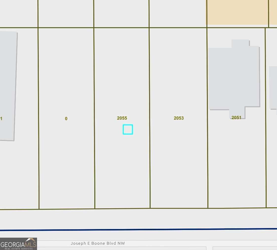 One of two adjacent C-1 lots for sale in Grove Park in the Westside Park Affordable workforce housing overlay. Lot Measures 50' x 150'