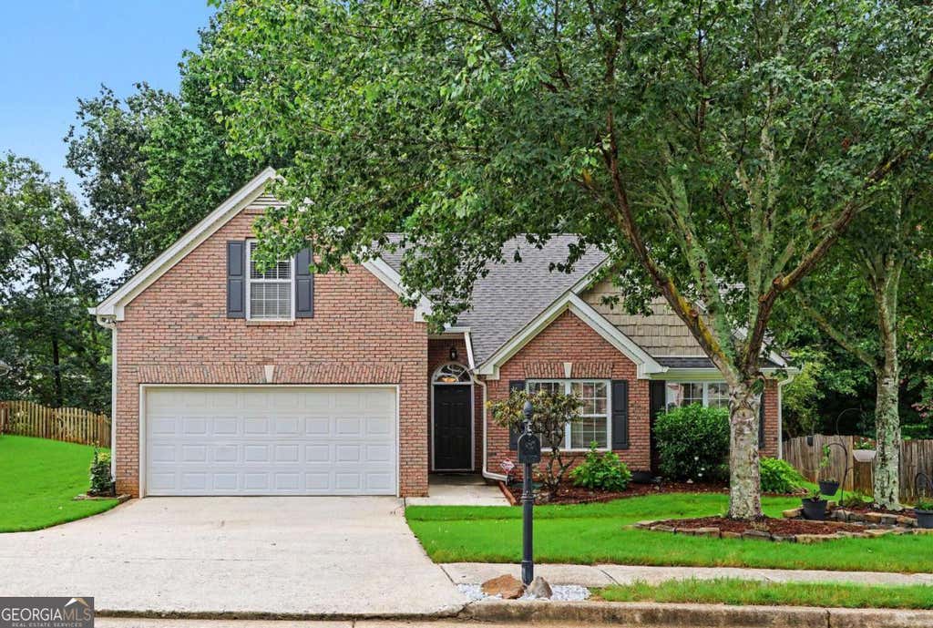 Photo of 2038 Wildcat Cliffs Lane, Lawrenceville, GA 30043 (MLS # 10825153)