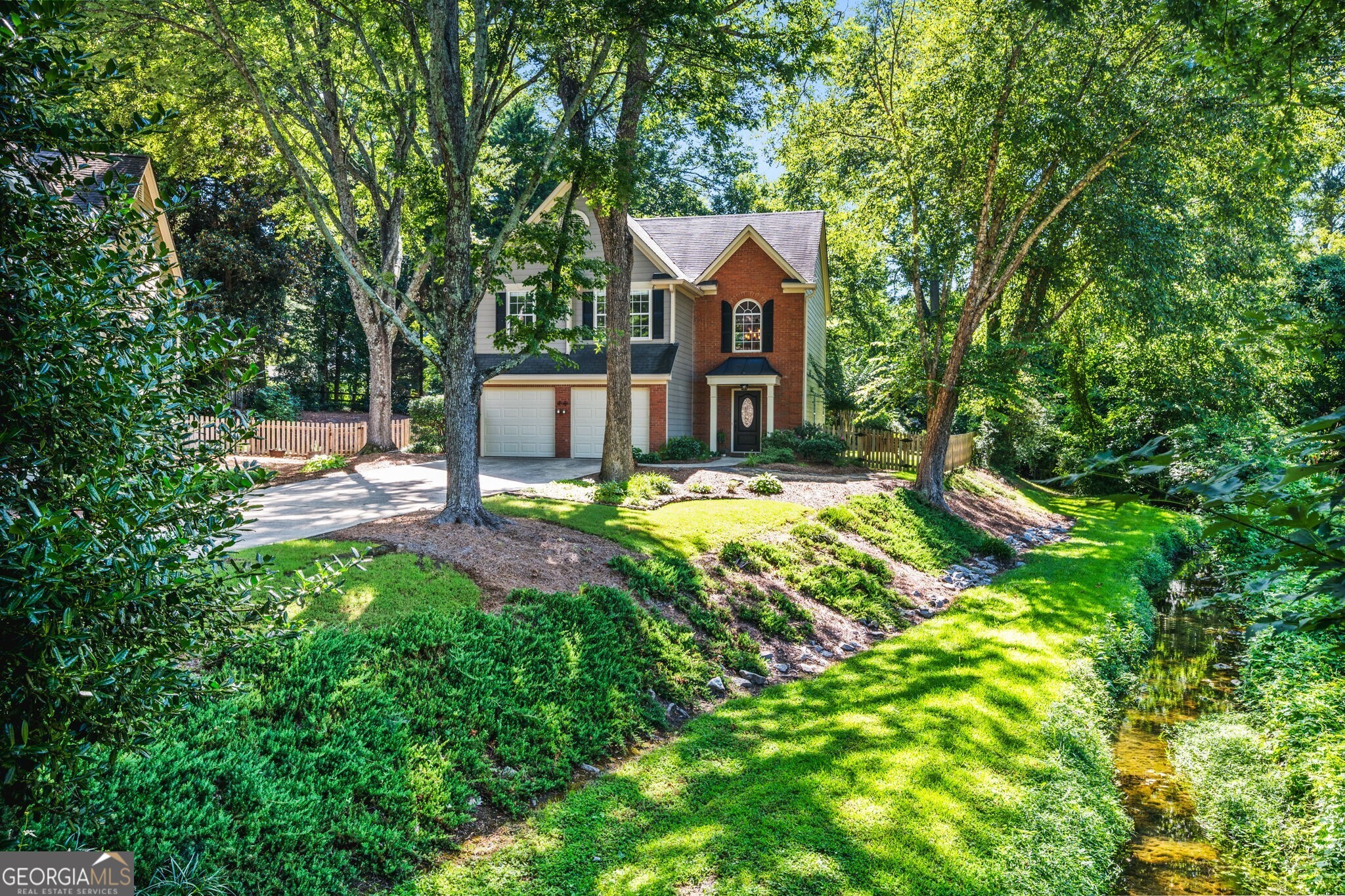 Charming Home in Coveted Whitlock Square - Steps from The Marietta Square! Discover the perfect blend of location, comfort, and style in this impeccably maintained 3-bedroom, 2.5-bath home located in the heart of Historic Marietta. Situated in highly sought-after Whitlock Square, this home offers unbeatable walkability to Marietta Square, where you'll enjoy restaurants, shopping, festivals, and local charm just minutes from your doorstep. Step inside to find pristine hardwood floors and a spacious layout designed for modern living. The oversized primary suite is a true retreat, featuring a beautifully renovated en-suite bath complete with a soaking tub, natural light, and elegant finishes. Additional highlights include the two-car garage, serene private backyard oasis, ample storage and thoughtfully designed living spaces, and located in the cul-de-sac of the neighborhood. Whether you're relaxing at home or exploring all that Marietta has to offer, this home delivers the best of both worlds. Don't miss your opportunity to own in one of the area's most desirable neighborhoods!