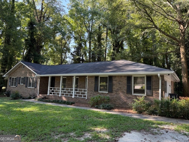 Charming 3-Bedroom Ranch on Over an Acre in Snellville! Welcome home to this inviting 1-story ranch featuring 3 bedrooms and 2 full baths, perfectly situated on a spacious 1.25-acre lot. Inside, you'll find fresh paint, new carpet, hardwood floors, and a brand-new AC unit for comfort and peace of mind. The cozy living room, complete with a fireplace, makes the perfect spot to gather with family and friends. Outside, a long driveway provides plenty of parking, while the large deck and fenced backyard offer endless opportunities for entertaining or simply enjoying the outdoors. Conveniently located near Highway 78, this home combines charm, comfort, and convenience in one great package!