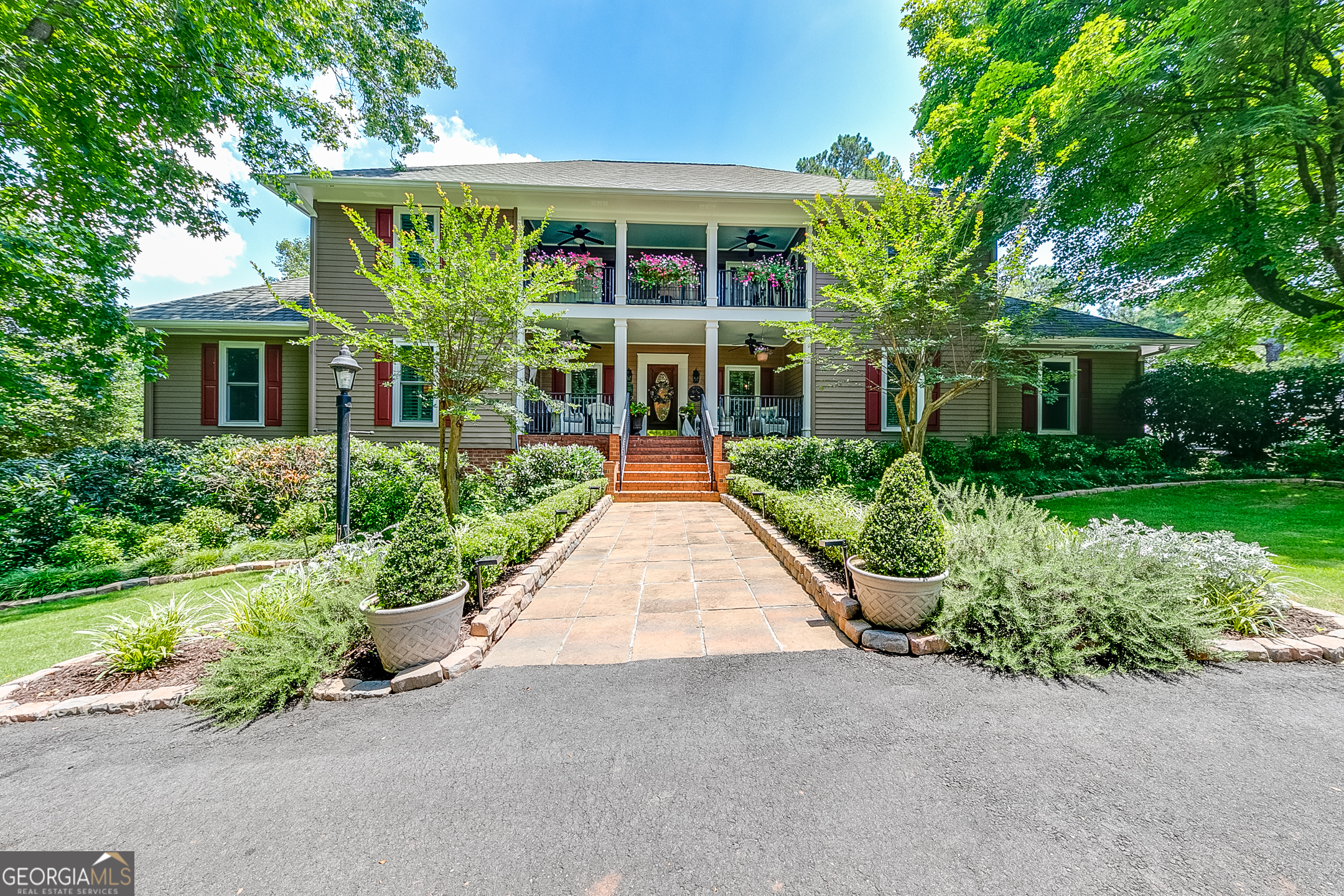 LISTING COMING SOON!! PROFESSIONAL PHOTOS ON THE WAY!! Where do we start? Famed UGA basketball coach, Hugh Durham, lovingly built this home as his personal estate in 1979. The current owner, only the third, painstakingly restored this southern belle to her former glory and it is SIMPLY BREATHTAKING! Located on almost 4 acres and nestled among other estates on large acreage tracts, enter the property off Old Jefferson Rd via a long winding driveway. There is also access along Walton Creek Rd. With AR zoning and no HOA affiliation, it is permissible for a few horses and stables. A circular driveway provides a grand entrance and plenty of parking for guests in addition to the side-entry two-car garage. As a nod to the original owner & UGA, you'll enter the home 'tween the hedges You can't help but notice the opulent landscaping which is fed automatically with a series of sprinklers (all well-fed). But just wait...there's so much more. A wide brick walkway leads you to the double balconied facade into the welcoming grand foyer. Inside, you are welcomed straight into the pages of Southern Living. Wide heart of pine plank flooring gleam and deep custom molding run throughout the home. Formal dining and living rooms flank the foyer. Thoughtful flow leads your guests to the massive great room with a large wood-burning fireplace and deep wood wainscotting. A large wetbar with granite counters, sink, custom built-ins, and refrigerator nook sits adjacent with a serving window. Tucked quietly beyond, is the 1st of two main-level powder rooms. Accessible through the great room, foyer, and dining room, is the kitchen. Brick flooring and accents, high-end appliances marble countertops, and custom built-ins make it a true chef's dream. Beyond, is the 2nd half-bath and large mudroom/laundry room - again with tons of custom built-ins. A wide rear deck runs the length of the home, overlooking the inground pool and gardens...but we'll get to that later. Upstairs, is the owner's suite with more storage and closets, that you'll need to go shopping to fill them. The bath is a spa-like oasis boasting a steam shower, deep soaking tub, and more custom built-ins. Two additional bedrooms and baths round out the second floor which also has those lovely heart pine floors and deep custom built-ins. The upstairs balcony is accessible from either the owner's suite or the front secondary bedroom - a wonderful place to enjoy your first cup of coffee. On the 3rd level, is a giant suite with sitting area, bedroom, and ensuite bath. Back downstairs to the terrace level, you'll find an unbelievable in-law suite. A gourmet kitchen, walk-in pantry, second laundry room, bedroom, bathroom, stone fireplace with gas starter, huge living room and sunroom area - this is a whole house itself. Per owner, this space is approximately 1500 sf. Large windows and French doors open to the massive patio and pool area. Outside, the owner's green thumb and decorating expertise continues to show. You'll appreciate the vignettes and outside "rooms". A large Martha Stewart garden shows off roses, peonies, fruit trees, raised veggie gardens all protected by deer fencing. Words and pictures just don't do it justice. The landscaping spinklers and pool are fed by well water. Timers and strategically placed water faucet wheels make maintaining the grounds easy for even those of us without green thumbs. Nitty gritty- the home is fed by 4 gas HVAC systems, 3 of which are new with UV light. The fourth one is newer as well. There are 2 gas water heaters - one is new and the other is less than 5 years. All the windows have been replaced by the current owner. All appliances have been replaced. The roof has been recently inspected with the roofer remarking on the quality and hardiness of the materials. Approx, 5,750sf.- this house is beyond solid. This home is remarkable in every way and the owners were reluctant to sell, but a new chapter is calling. Be the one to make this one your next chapter!
