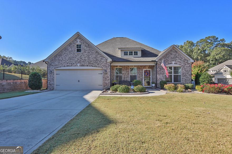 2.625% Rate Assumable VA with Roam! IMMACULATE CONDITION, HOME GENERATOR, LARGE CEILINGS, EXPANSIVE LOT.  Welcome to 3848 Heirloom Loop Court, an Immaculate traditional home nestled in the highly sought-after Preserve at Hamilton Mill. Situated on the largest lot in the subdivision, this stunning 3-bedroom, 2.5-bath offers a rare blend of space, style, and serenity, not to mention the 75 foot driveway. From the moment you enter, you're greeted by 10-foot ceilings, an abundance of natural light, and a striking 15-foot vaulted ceiling in the great room. The layout is open yet inviting, perfect for both entertaining and daily living. Enjoy upgraded features throughout, including stainless steel appliances, a whole-home generator, and a gorgeous screened-in porch (sunroom), the perfect spot for morning coffee or evening relaxation. The fenced backyard offers room to roam, garden, or simply unwind. Just minutes from Lake Lanier, Mall of Georgia, and major routes including I-985 and I-85, this home delivers lifestyle, location, and luxury.