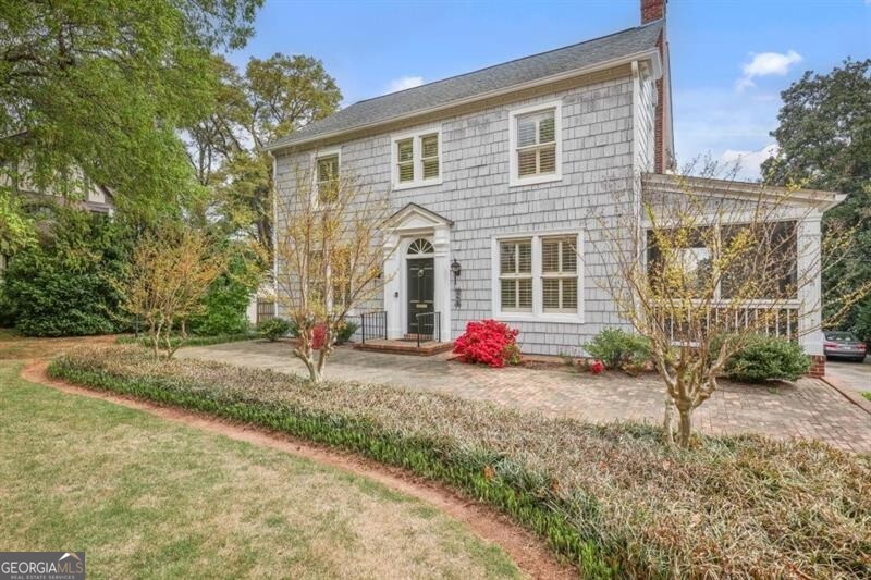 ADORABLE Historic Cape Cod in Downtown Marietta that is 102 years old! The Blair-Wright-Johnson house was built by Marietta Judge DW Blair, who lived next door, for his newlywed daughter, Christine Blair Wright and her husband. Their son, Charles Bagley Wright, was born in the home and went on to design the Seattle Space Needle! The home features all of the original charm, including cedar shake siding, an incredible staircase with fully intact railing, two original mantels, and an original hand-carved front door surround that will blow your socks off! The home sits on a beautiful lot with a landscaped yard, a brick patio off the rear of the home, and then a Cherokee Fieldstone patio/outdoor dining area further out. The kitchen has tons of old-world charm, and the cellar has ample space for a workshop. Appointment only.
