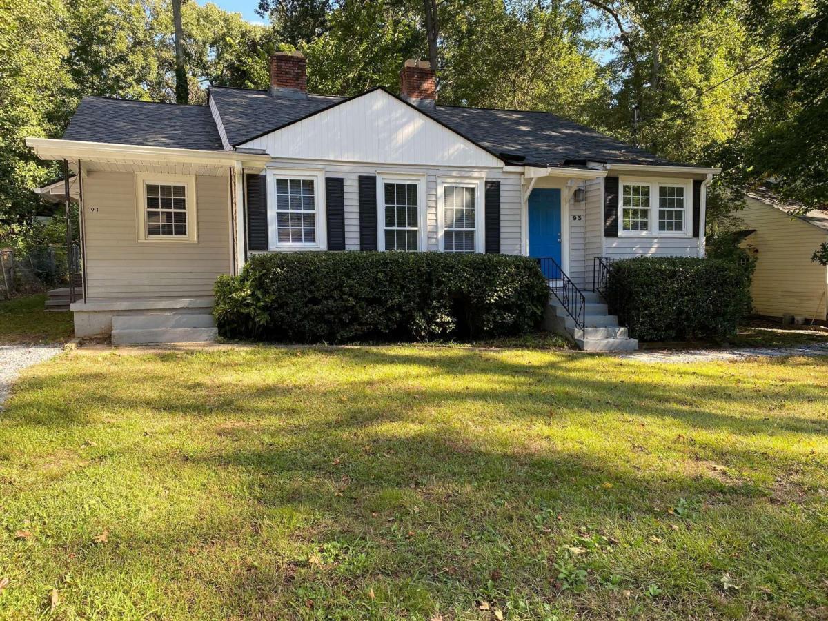 Charming Bungalow Minutes From Marietta Square. 5 Bed/3 Bath. Former Duplex Converted Into SFH, Gives This Beauty Lots of Space And Potential Privacy.  4 Bedrooms and 2 Full Baths Are On The Main Level. Huge Private 5th Bedroom/Office/Loft with Private Full Bath Upstairs. Perfect For A Teen Suite or Work From Home Office. Hardwood Floors Throughout Main Level, Living Room, Family Room, and Additional Bonus Room with Wet Bar. Location Is Amazing. Easy Access to Major Highways, Restaurants, Shops and Events At Marietta Square.