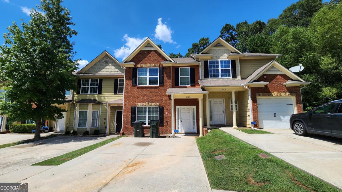 Make a great deal even better with Massive savings through special loan programs with the Preferred Lender Envoy Mortgage with Aubrey Wilcox! Ask the Listing Team for the introduction for up to 100% Financing or even interest rates in the 4s! This 3-bedroom, 2.5-bath townhome in the Benton Woods community offers a great opportunity to own in a growing Covington location with room to build equity. Featuring a spacious and functional layout, the home includes an open-concept main level with a large living area, dining space, and a kitchen with ample cabinet storage. The upstairs features generously sized bedrooms. While some areas of the home could use cosmetic updates and finishing touches it has plenty of potential for customization. Located just minutes from Covington's historic square, shopping, dining, and easy access to I-20, this property is ideal for first-time buyers, investors, or anyone looking for affordable in-town living.