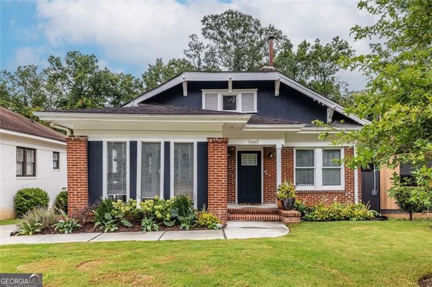 This home may qualify for a below-market interest rate-ask for details! Charm, space, and unbeatable BeltLine access come together in this beautifully maintained Westview bungalow. The flexible floor plan includes a light-filled sunroom that can serve as a 4th bedroom, home office, or cozy den-your choice! Just a few blocks from the Atlanta BeltLine entrance and the vibrant Lee + White district, you'll have some of the city's favorite restaurants, breweries, and coffee shops right at your fingertips. Inside, an open, airy layout connects the living room with fireplace, dining area, and renovated kitchen featuring white cabinetry, quartz countertops, and a spacious island perfect for gathering. The primary suite overlooks the backyard and features a stylish bath with walk-in shower, while two additional bedrooms share an updated hall bath. A full-height basement provides plenty of space for storage, hobbies, or a creative studio. Out back, the fenced yard offers room to garden, play, or even add a garage or ADU. With pristine condition, generous space, and the potential for special financing through the seller's preferred lender, this Westview gem delivers both lifestyle and value-just steps from the BeltLine.