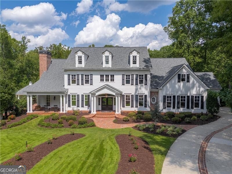 Welcome home to your private 4.28 acre estate in the gated community of Providence Plantation.