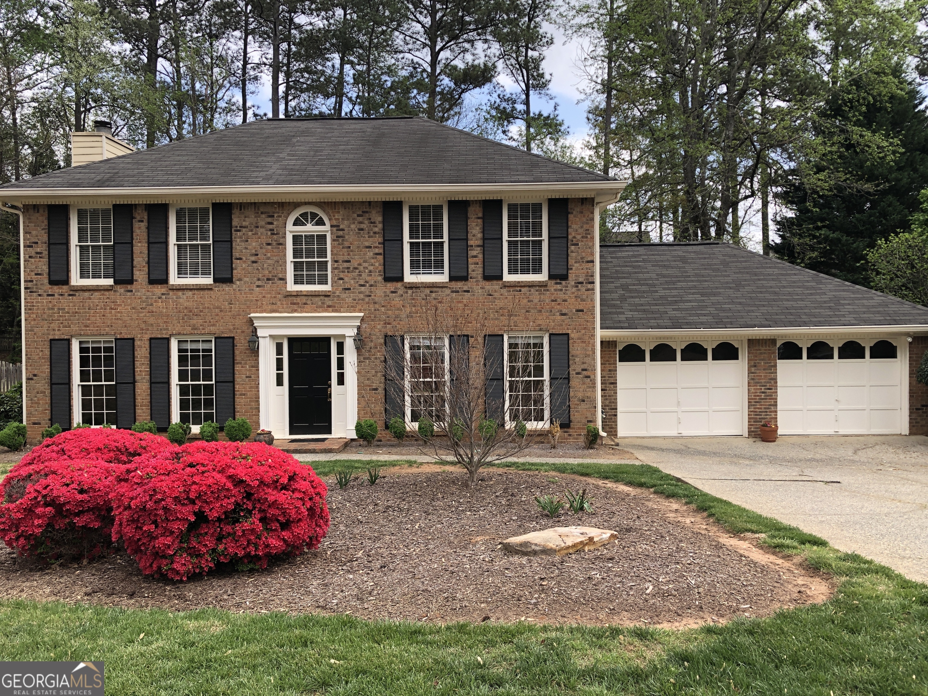 Welcome home! Great opportunity to live in this stunning, well-maintained three-bedroom, two-and-a-half-bathroom home in the popular Sewell Springs Community. The main level features a family room with fireplace and French doors that lead to a large deck. The deck is level to the backyard and provides a walk-out to a beautifully landscaped backyard. Just off the family room, you will find the eat-in kitchen with stainless=steel appliances. There is a large formal dining room for entertaining. Plenty of windows provide an abundance of natural light on the main level. The second floor includes a large master suite with trey ceiling, spa-like master bathroom with vaulted ceiling, double sinks, separate shower & whirlpool tub, and a walk-in closet. There are two additional bedrooms and a full bath. The laundry room is conveniently located on the second floor. The home is located in highly sought-after schools - Murdock elementary, Dodgen middle school and Walton high school conveniently located in east cobb minutes from I-75, I-285, airport, Truist Park, East Cobb Park, The Avenues and fantastic shopping/restaurants.