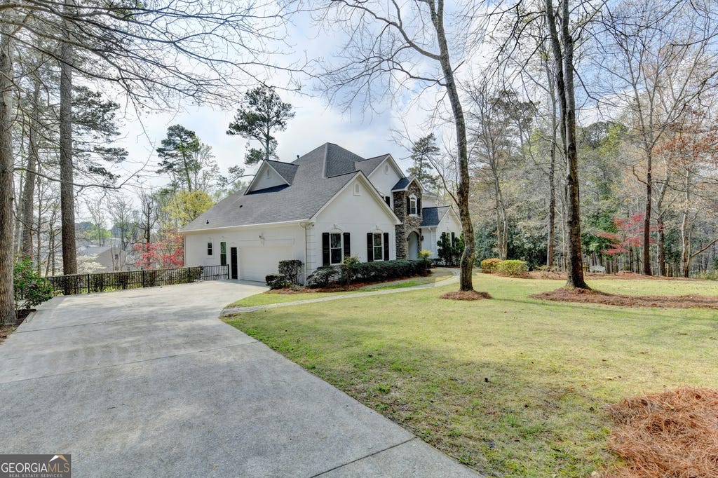Photo of 6336 Old Shadburn Ferry Road, Buford, GA 30518 (MLS # 10814450)