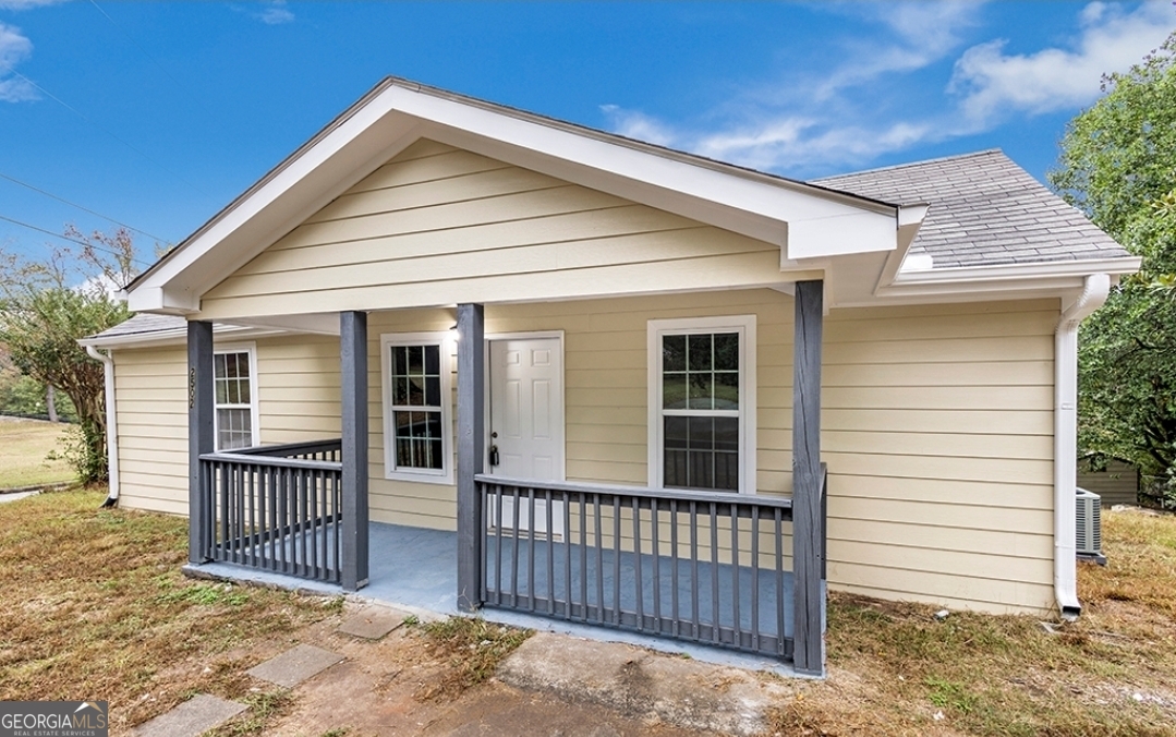 Welcome to 2502 Park Dr, a charming 3-bedroom, 2-bath bungalow nestled in the heart of historic Lithonia. This updated 1940s home offers a cozy layout with an open dining area, a bright kitchen with white cabinetry, and comfortable living spaces-all on one level. The spacious front and backyard provide plenty of room to relax or entertain, and the covered front porch is perfect for enjoying quiet afternoons. Located just minutes from I-20, downtown Atlanta, and public transit, this home offers easy access to shopping, dining, and schools including Lithonia Middle and High. Enjoy nearby parks, walking trails, and the charm of a close-knit community. Ideal for small families or professionals, this home combines comfort, convenience, and character in one affordable package.