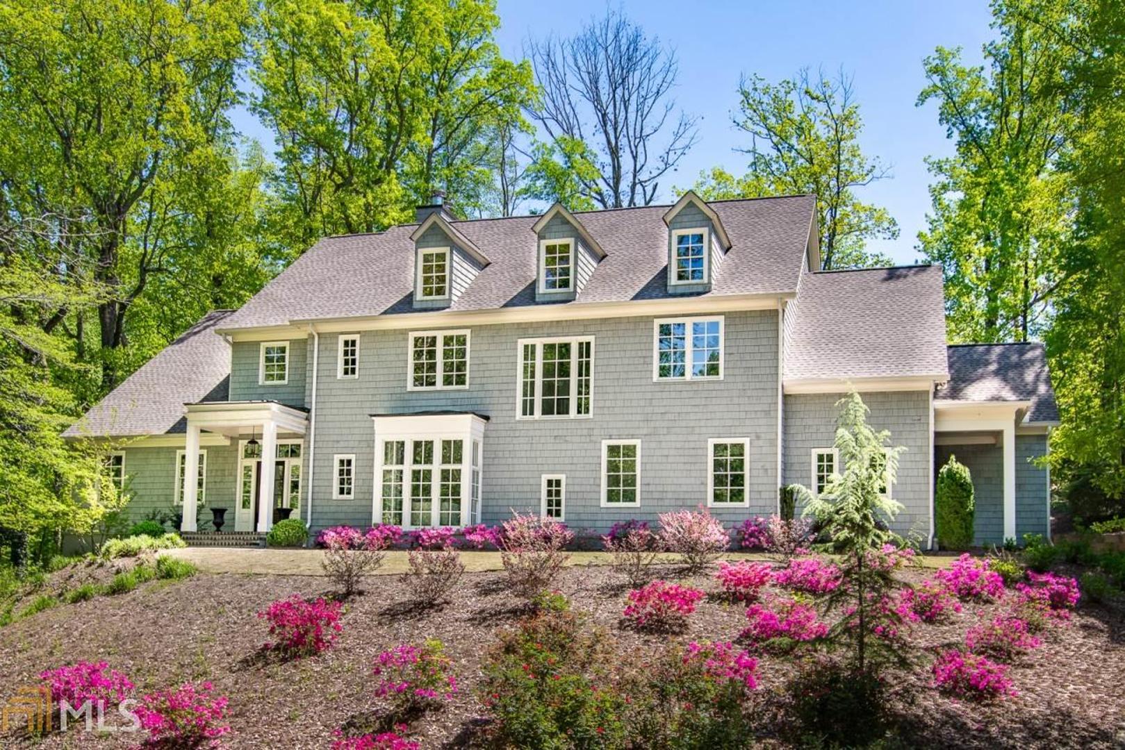 Stunning Luxury on 1 acre lot w/ high-end, custom finishes & features. Unique open plan w/ spacious, light-filled living areas. Chef's kitchen w/ Bertazzoni range, Viking fridge, Silestone counters, custom cabinets. Main-level master w/ marble, freestanding garden tub, Kohler fixtures, & frameless shower w/ rain head. Private office, mud room, 3 sided window Den opens to covered porch w/ 36" outdoor fireplace. Private backyard on a wooded lot w/ room for pool. 4 generous suite bedrooms + bonus loft area. Terrace level w/ Media Room, guest suite, full bath. 2 car.