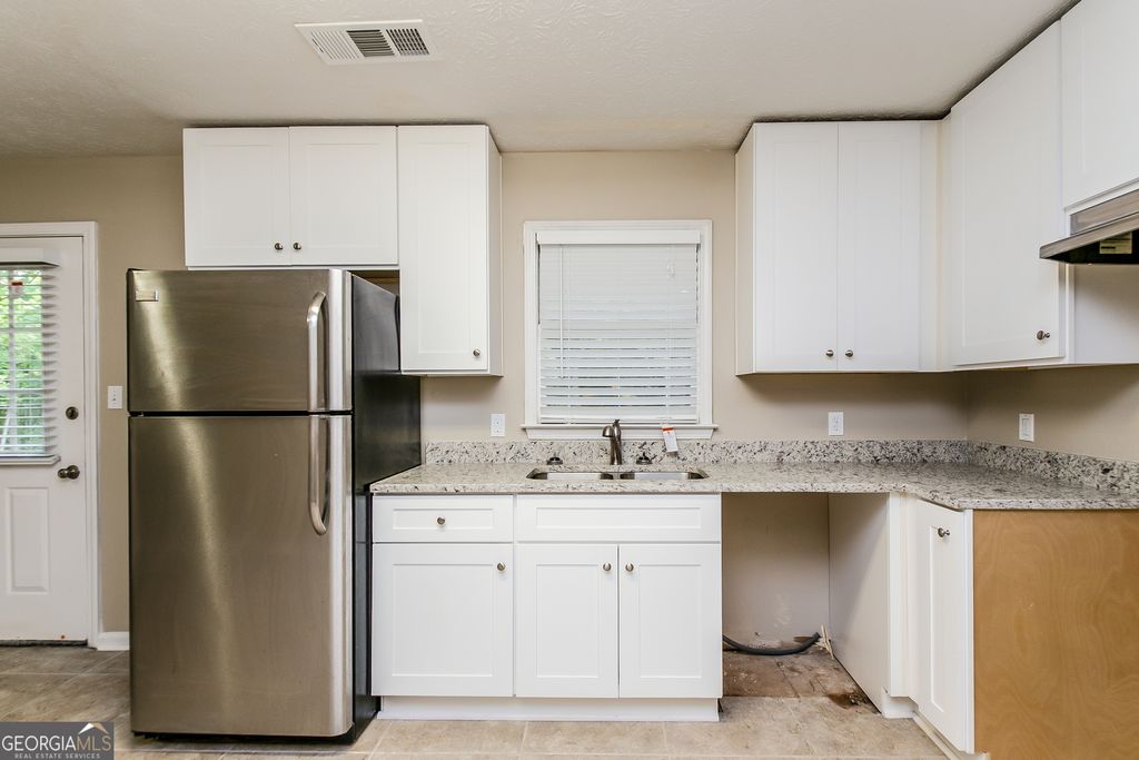 Photo of 3940 Scott Drive, Forest Park, GA 30297 (MLS # 10676336)