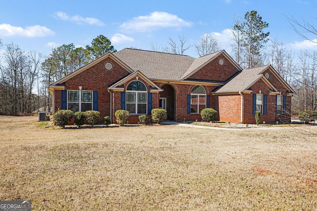 Photo of 12391 Hillcrest Drive, Hampton, GA 30228 (MLS # 10694116)