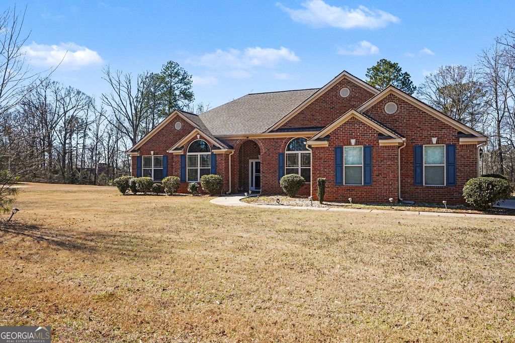 Photo of 12391 Hillcrest Drive, Hampton, GA 30228 (MLS # 10694116)