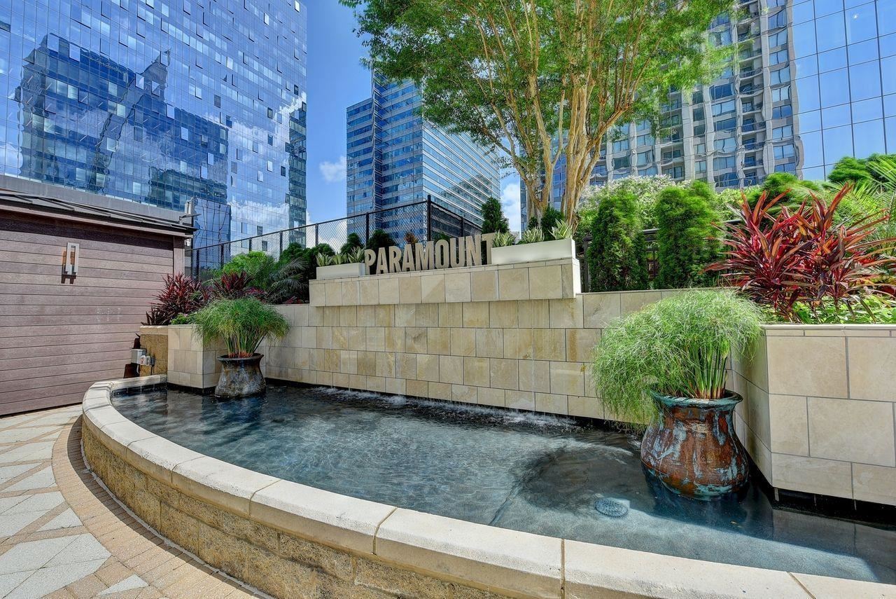 Buckhead's finest Hi-Rise luxury living in the amazing Paramount at Buckhead! Cozy one bedroom/one bath with separate office/den/dining area. Large private walk-out balcony off living room overlooking the saline pool and tennis court. Every detail considered; Large custom designed walk-in closet, stone countertops, with beautifully matched tile backsplash, S/S appliances, washer/dryer, hardwoods, tile bath and kitchen floors, and W2W carpet in bedroom. This condo comes with one of only a few temperature controlled private wine locker, and one assigned parking space. The unsurpassed amenities include, 24 hour concierge, indoor and outdoor theaters, two fitness centers, private lounge, pool, and tennis. Private quick access to GA-400and interstates. Walk to Marta, Lenox & Phipps Mall and top restaurants. Stop your search....You have found the condo you have been looking for!!!!Seller is including a 1 year home warranty with sale of the property.