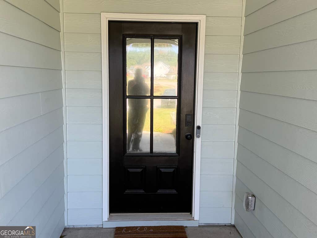 Photo of 525 GRAND OAKS Ave, BETHLEHEM, GA 30620 (MLS # 10832076)