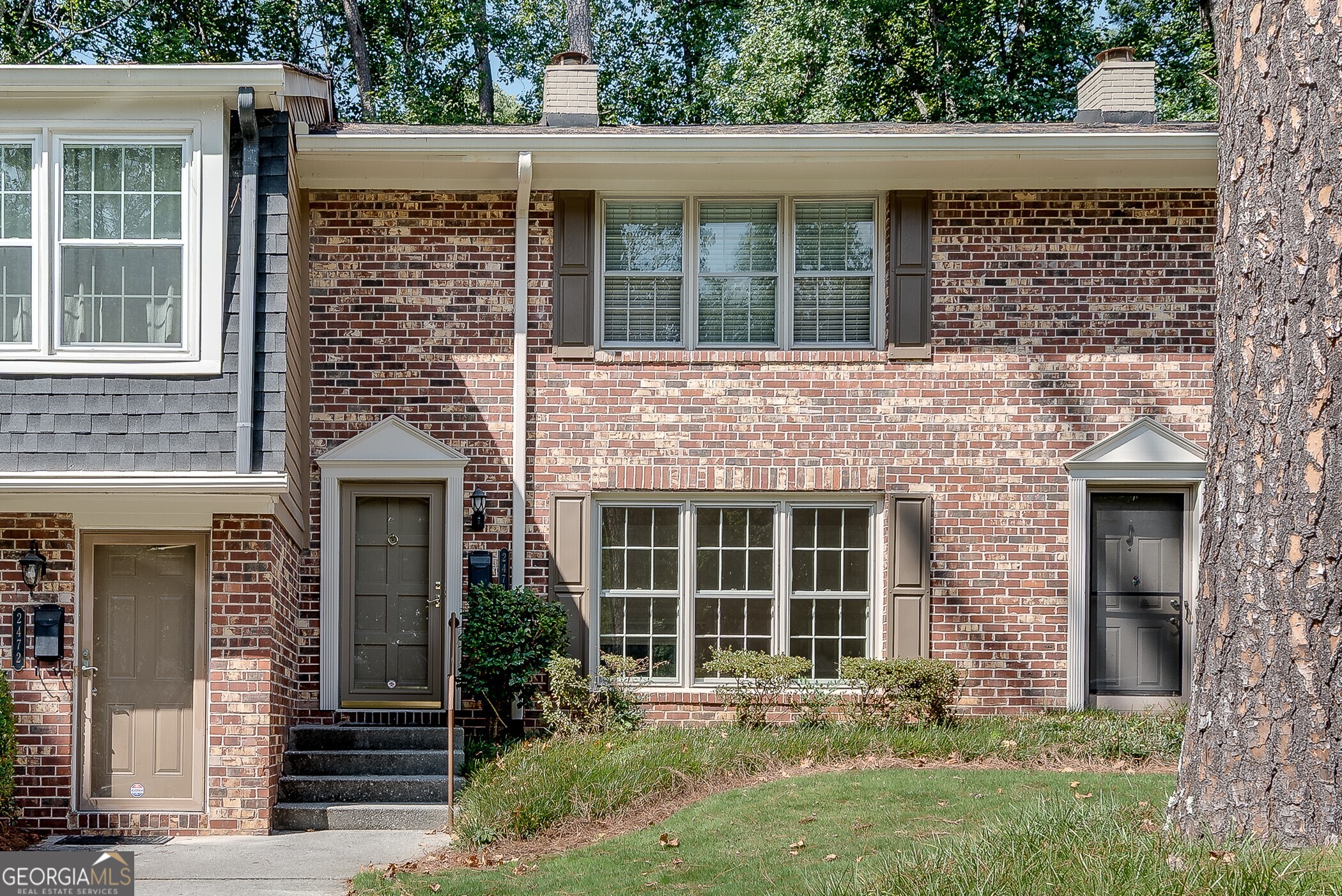 Tucked away in a serene lakeside community, this immaculate 2-bedroom, 2.5-bath townhome offers the perfect blend of tranquility, comfort, and convenience. Set at the back of the neighborhood in a peaceful, park-like setting, it's an ideal retreat. As you step inside, you'll find a freshly painted, bright and welcoming interior. The spacious living room features wood floors and a wood-burning fireplace. The eat-in kitchen, with solid surface countertops, flows to a formal dining room with French doors hat open to a deck and private backyard surrounded by lush greenery. Upstairs, the generous primary suite offers a walk-in closet and a renovated, spa-inspired bath. The second bedroom also features a large closet and an updated ensuite bath perfect for guests or a home office. Community amenities include scenic walking trails through mature landscaping, leading to private lake access and boat storage for your canoe or kayak. HOA dues cover exterior maintenance and landscaping, ensuring easy, low-maintenance living in a friendly, owner-occupied neighborhood. Located within the Lakeside High School district, this home is just a short walk to the newly revitalized Northlake Mall and Emory Administrative Complex. You'll also enjoy close proximity to Emory, CDC, Mercer, Oglethorpe, VA, I-285, I-85, and the proposed Tucker-Northlake Trail a new multi-use path connecting downtown Tucker to the Northlake area. With its peaceful surroundings, updated interiors, and unbeatable location, this townhome is more than just a great value it's a wonderful place to call home.