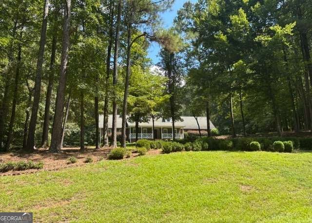 Photo of 94 Deer Creek Trail, Hoschton, GA 30548 (MLS # 10839741)