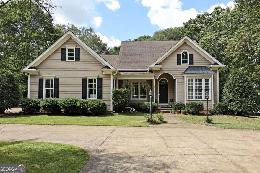3+/- gorgeous Alpharetta acres with low Cherokee taxes and excellent schools! Bring your horses or car collection! Detached workshop/garage, RV hookup & dump, prewired for a generator. High speed business internet. Beautiful pasture & gardens, nothing missed! This one story home features a total of 5 bedroom suites, eat-in kitchen open to the breakfast room. Separate formal dining room and fireside great room. 2-car attached garage has easy access to the kitchen. Lower level has a full bedroom & bath, family room and storage. Property is gated and fenced. Use Google maps, not Apple maps for GPS. Huge Fenced with water sprinkler installed farm area.  Gas cook top installed in 2023. New refrigerator, washer dryer unit installed in 2023. Newly furnished guest room, hall and buffet area in the basement.