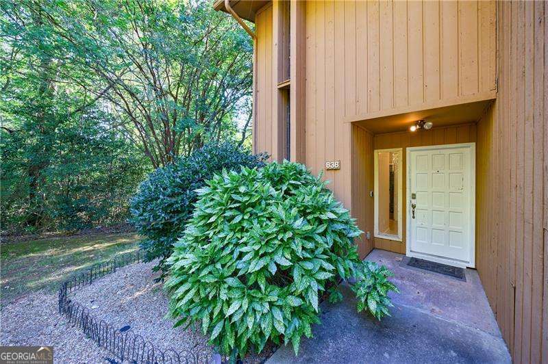 It's a lovely end-unit townhouse in the heart of Marietta! As you enter, the spacious foyer is inviting, and the open-concept living room has a focal fireplace to warm the hearts during those holiday events with family and friends. The newly updated galley-style kitchen offers brand-new stainless-steel appliances and helps to warm the bellies of those you love with your special recipes. Two additional ensuites encompass the home's upper level, offering massive bedrooms, remodeled bathrooms, and a bonus enclosed four-season area to soak in the serenity of nature and all its splendor. Close to all shops and immediate access to major highways. Looking for an investment rental to build your portfolio or just a new place to call your own? This may be the one you have been waiting for!